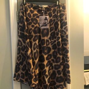 Beautiful silk leopard print blouse with one arm hole